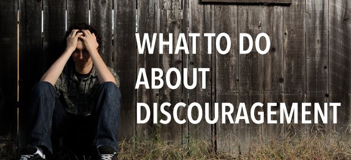 LIVING IN TRIUMPH OVER DISCOURAGEMENT